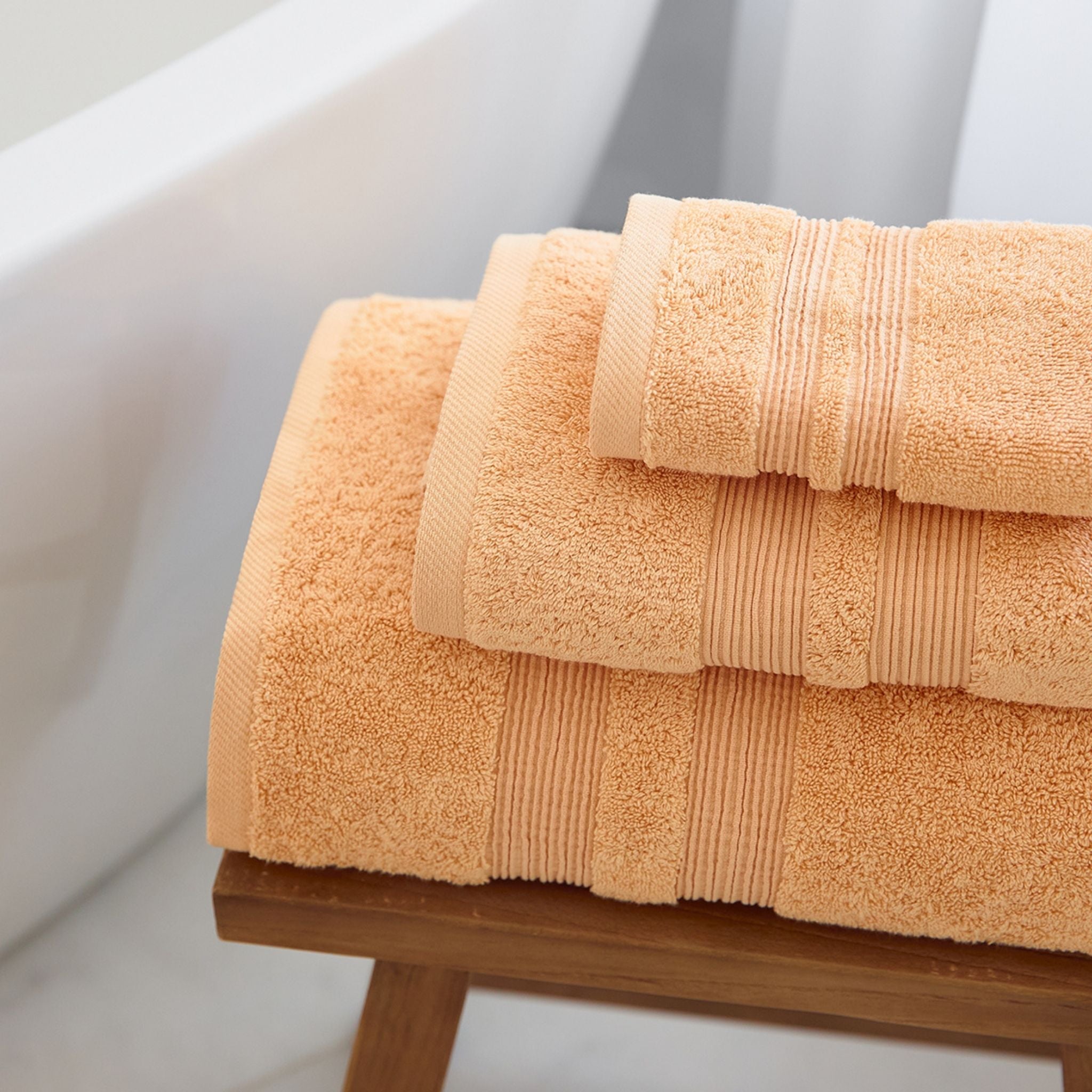 torres-novas-bath-elegance-plain-3-piece-towel-set-light-orange-lifestyle-3.jpg