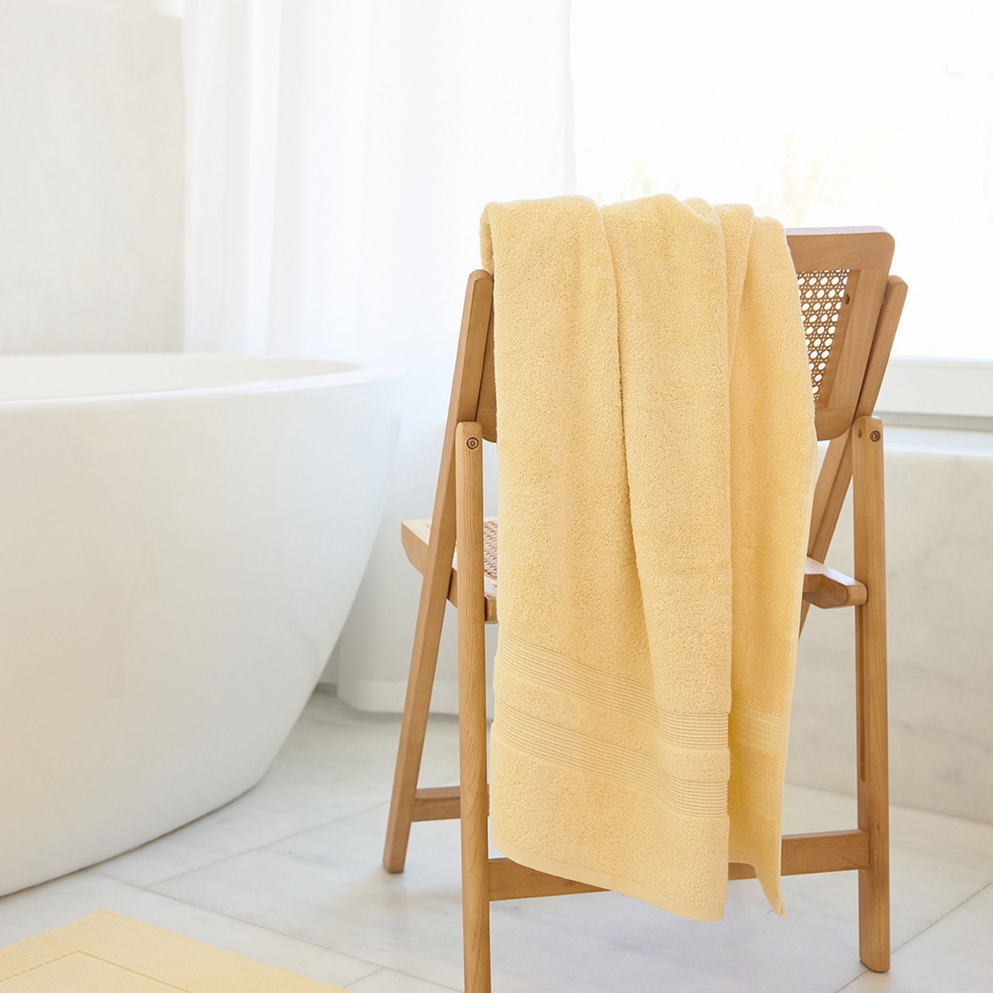 torres-novas-bath-elegance-plain-bath-towel-yellow-chic-lifestyle-2.jpg