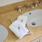 Luxus guest towel with retro swimmers and skiers embroidery (pack of 2)