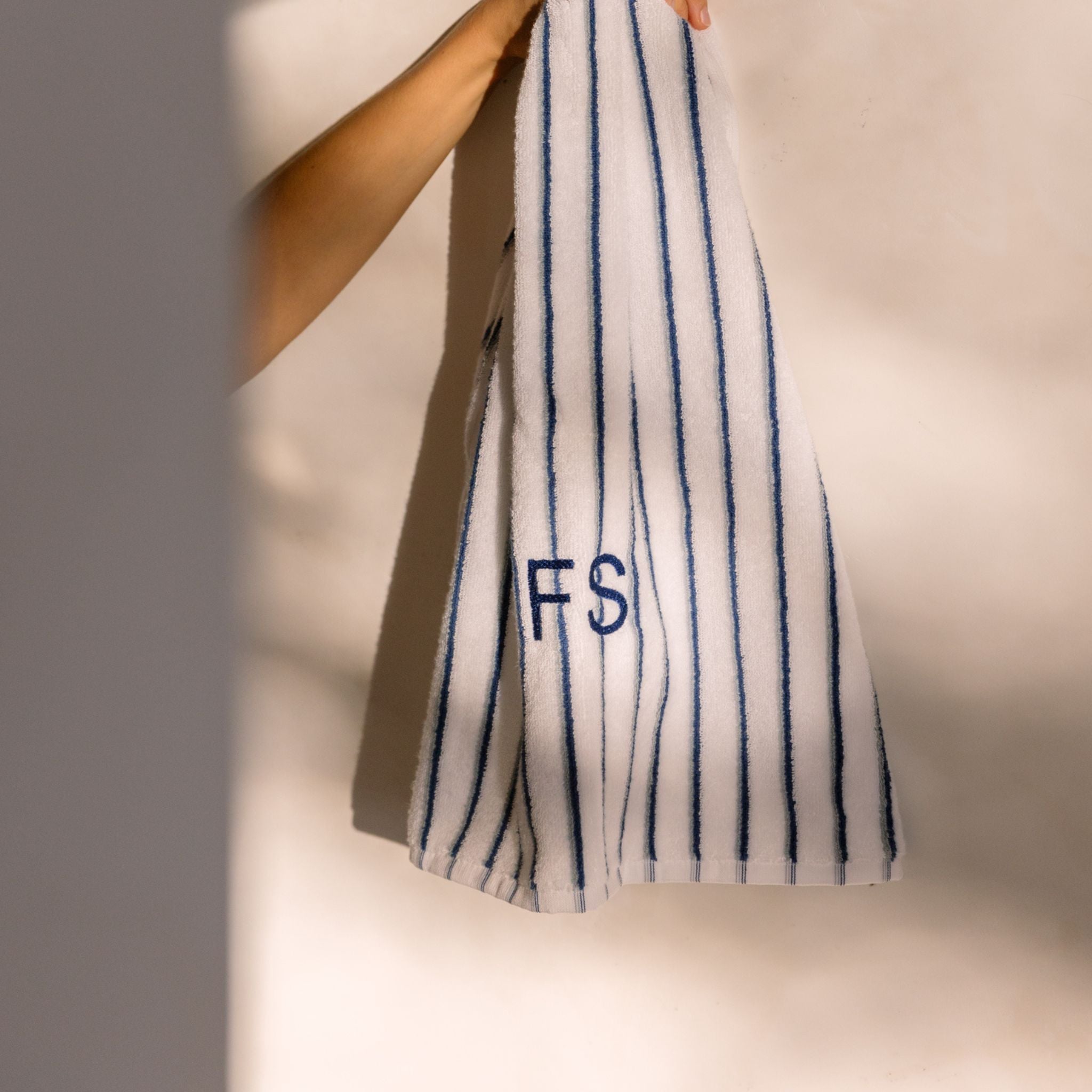 torres-novas-bath-lima-vertical-stripes-bath-towel-blue-grey-lifestyle-2_51905d24-95dc-4cf5-808a-350738a4b911.jpg