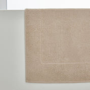 Beige bath mat