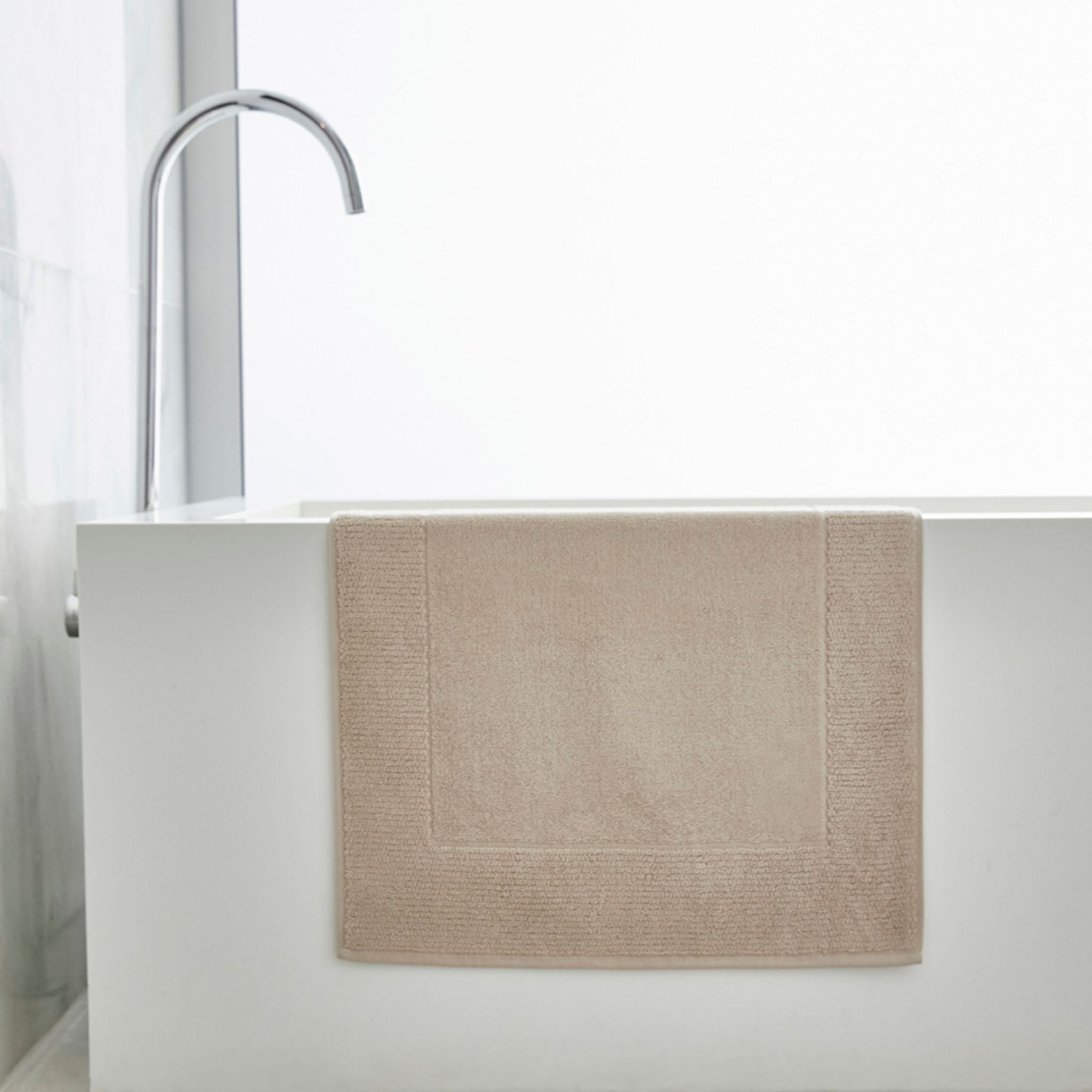 Beige bath mat