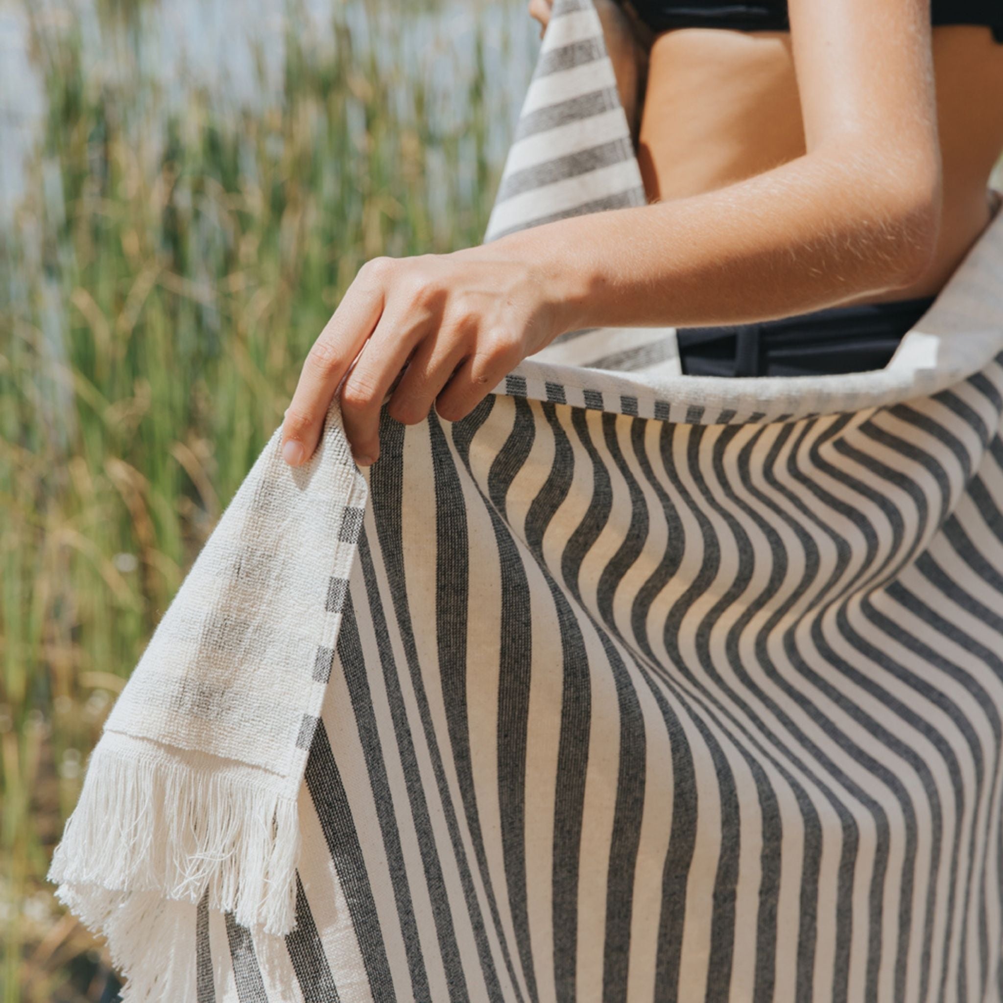 torres-novas-beach-barra-horizontal-stripes-towel-black-lifestyle-1.jpg