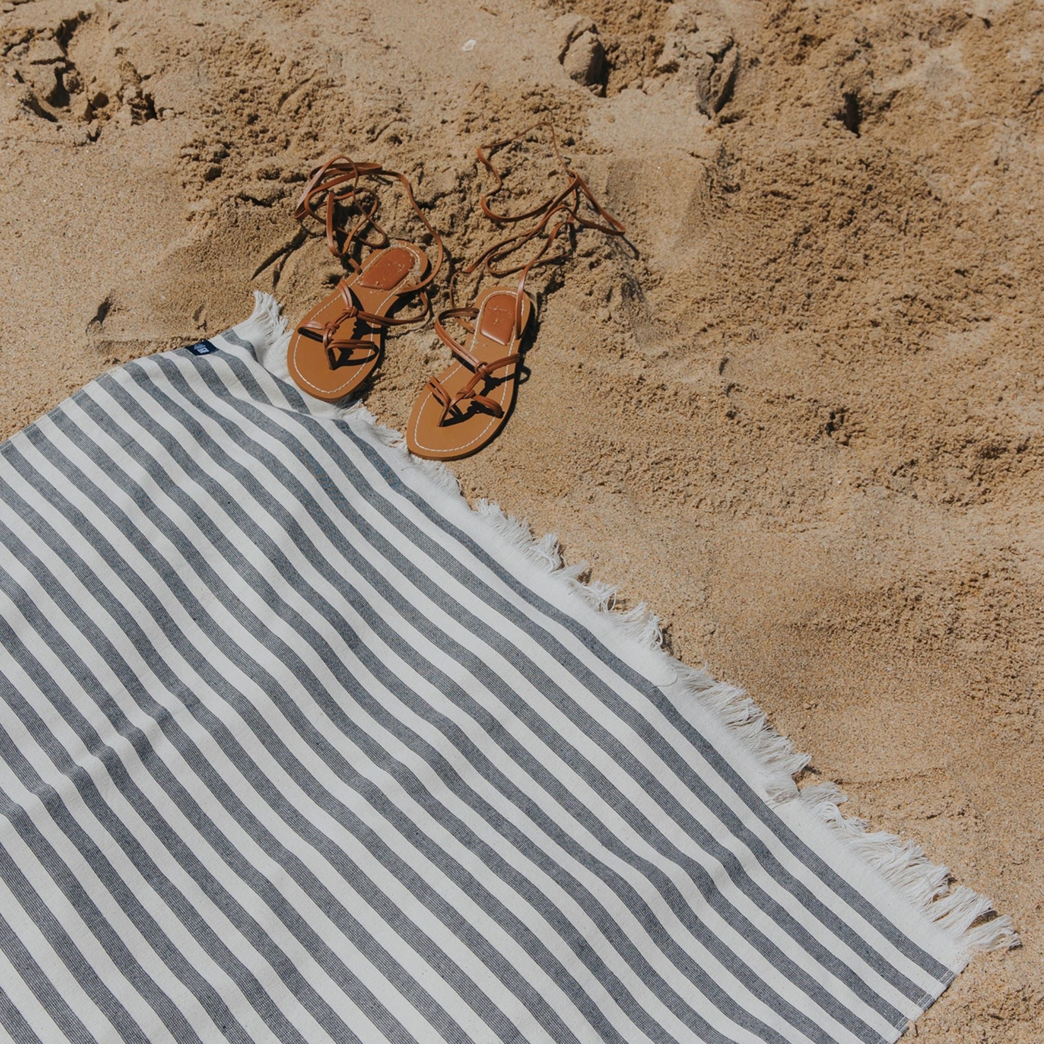 torres-novas-beach-barra-horizontal-stripes-towel-black-lifestyle-2.jpg