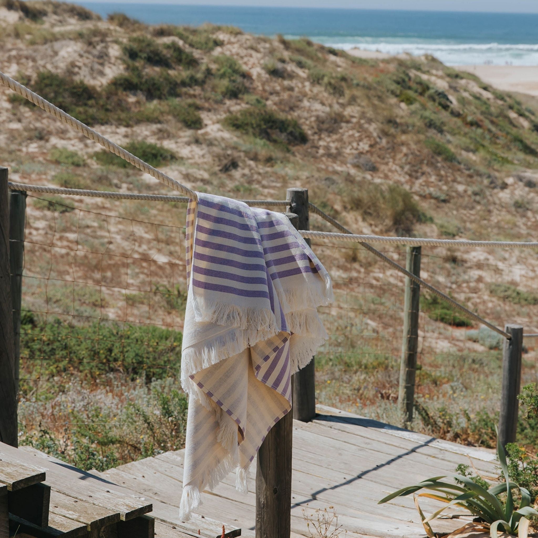 torres-novas-beach-barra-horizontal-stripes-towel-lavender-lifestyle-3.jpg
