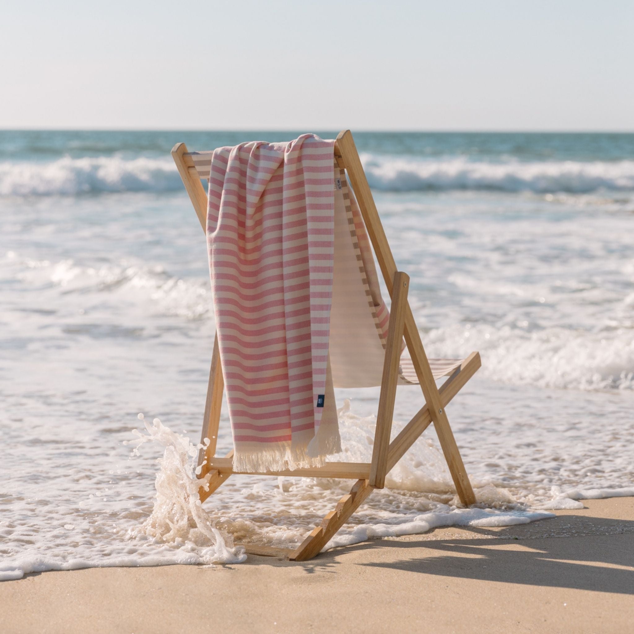 torres-novas-beach-barra-horizontal-stripes-towel-pink-lifestyle-2.jpg
