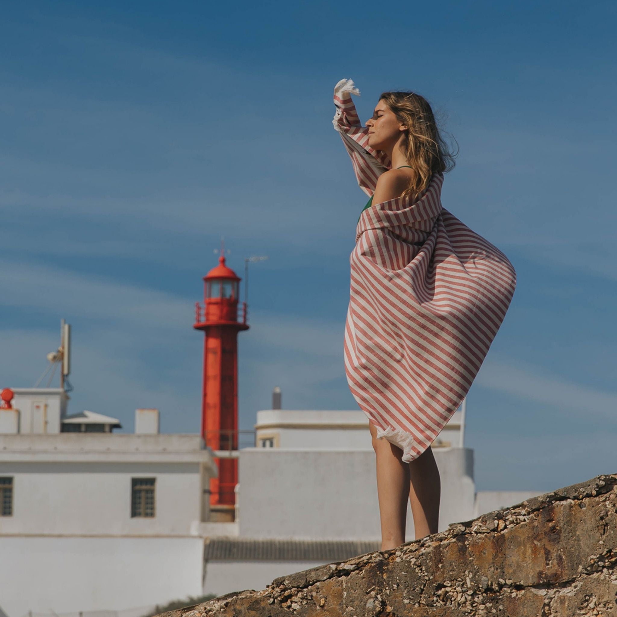 torres-novas-beach-barra-horizontal-stripes-towel-red-lifestyle-2.jpg