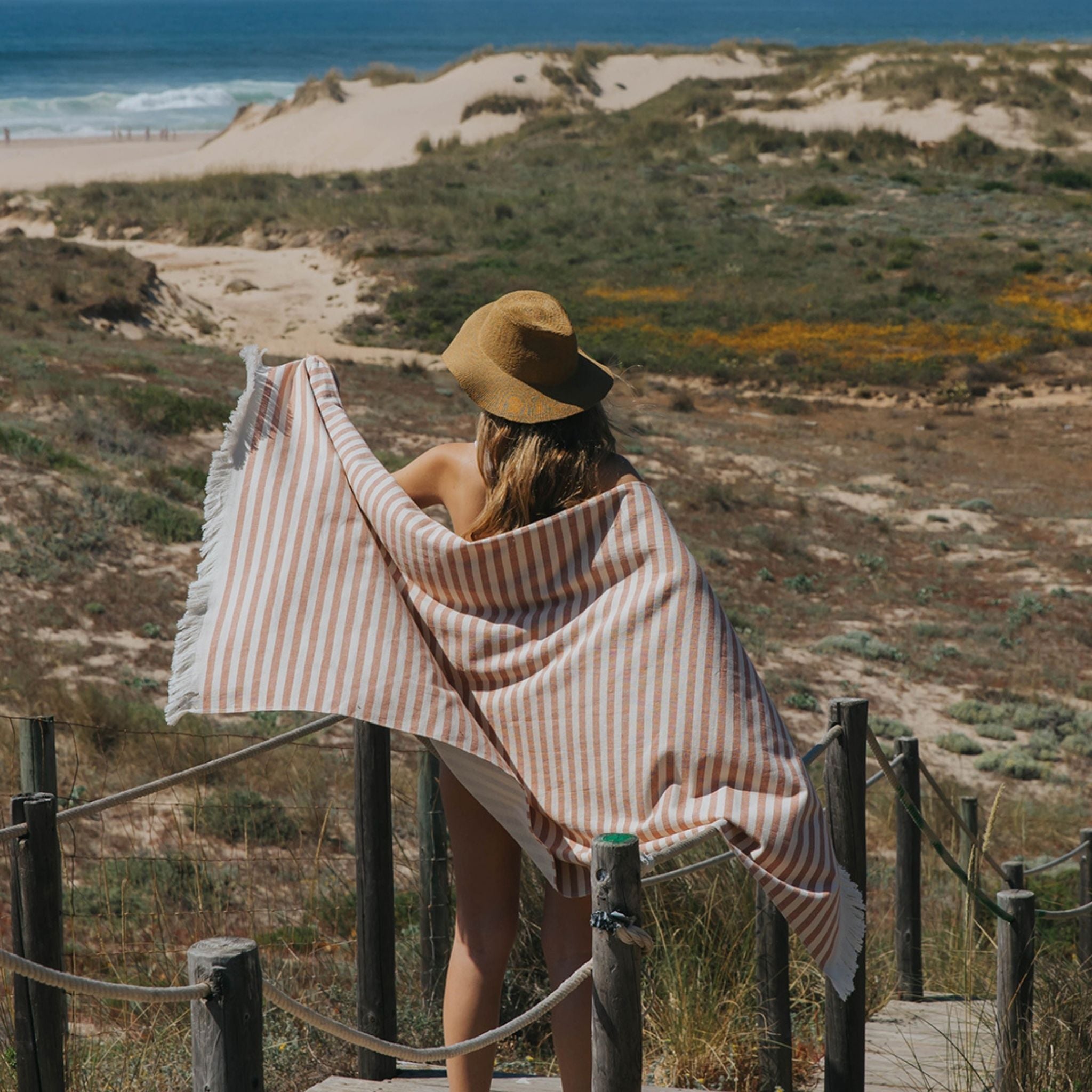 torres-novas-beach-barra-horizontal-stripes-towel-terracotta-lifestyle-2.jpg