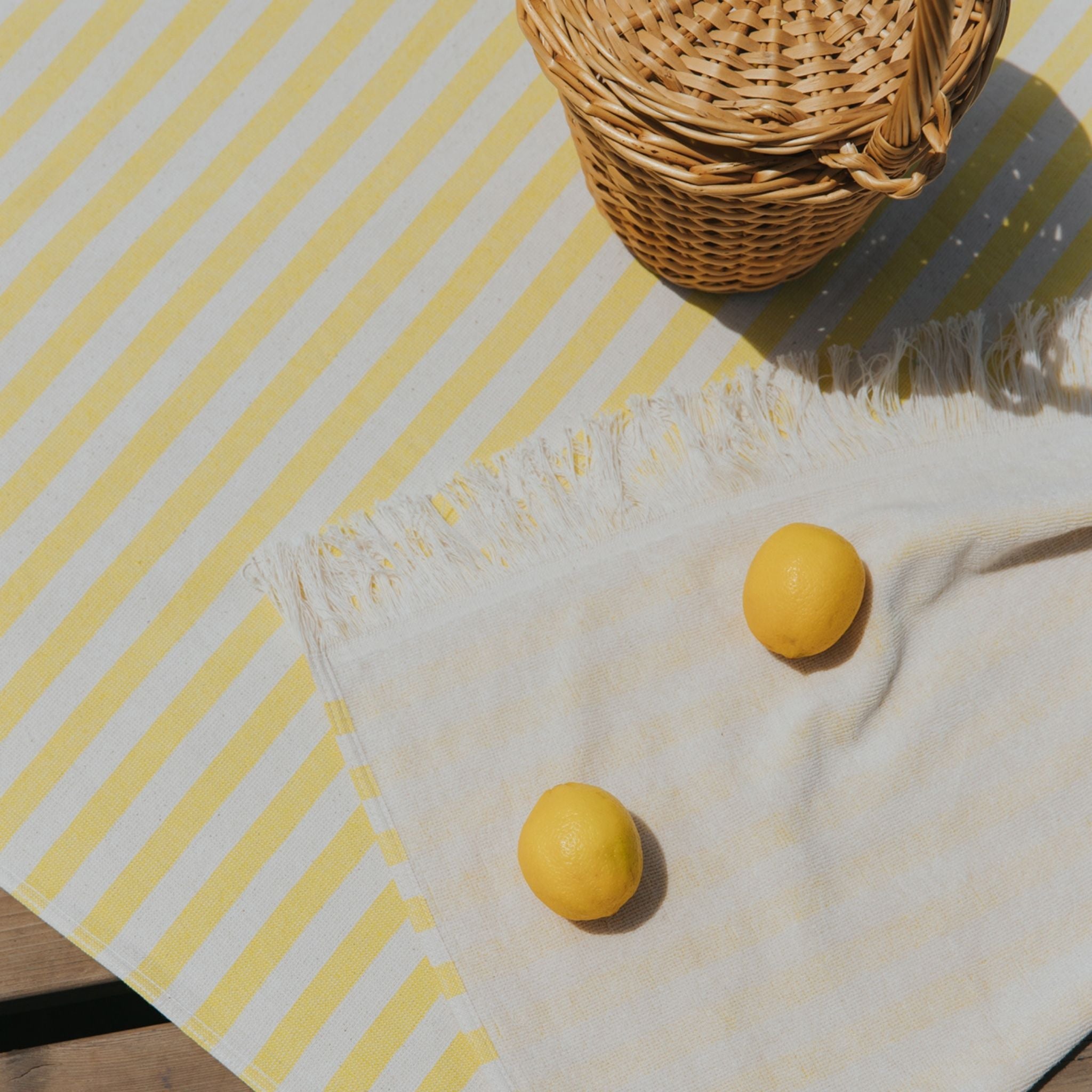 torres-novas-beach-barra-horizontal-stripes-towel-yellow-lifestyle-1.jpg