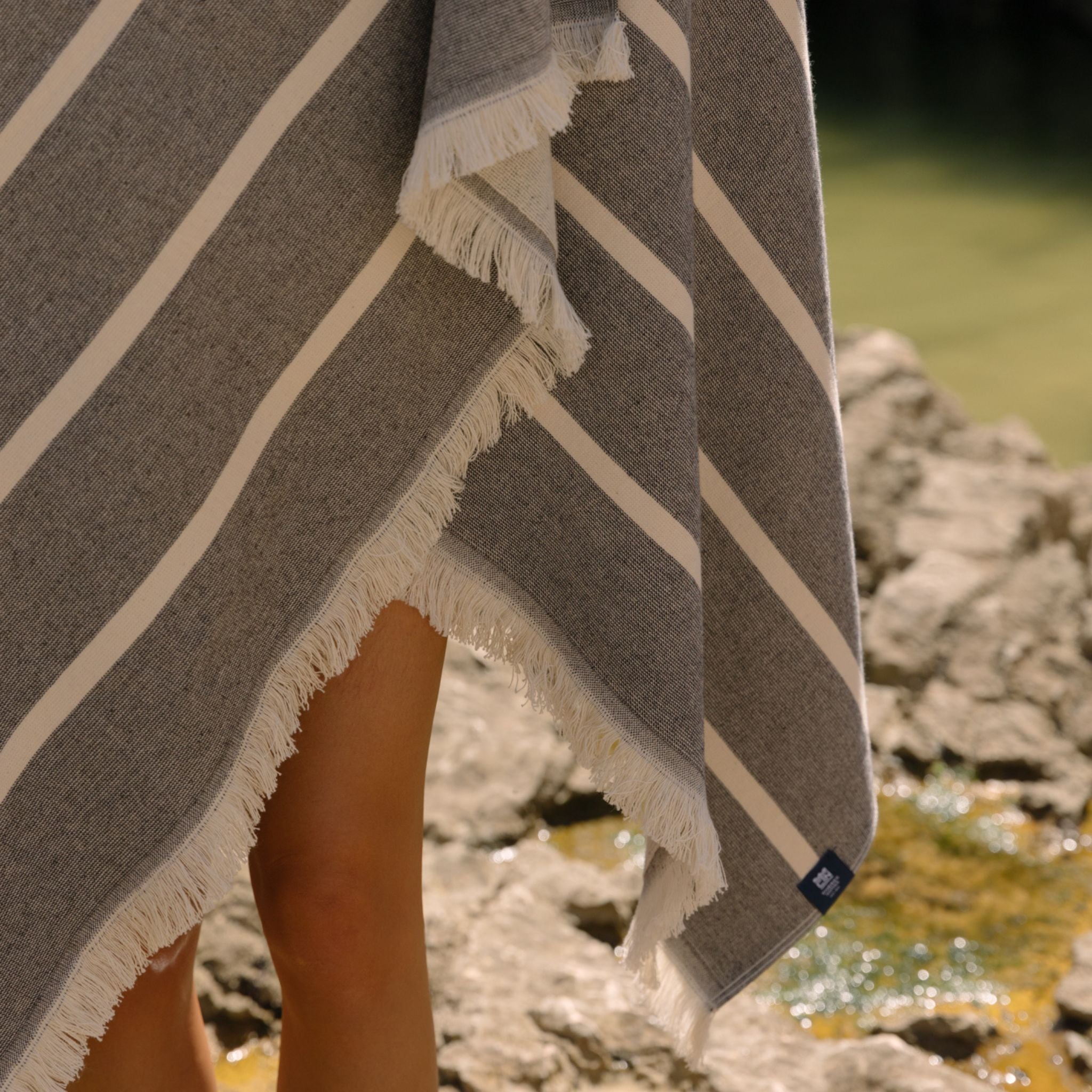 torres-novas-beach-belem-horizontal-stripes-towel-black-lifestyle-1.jpg