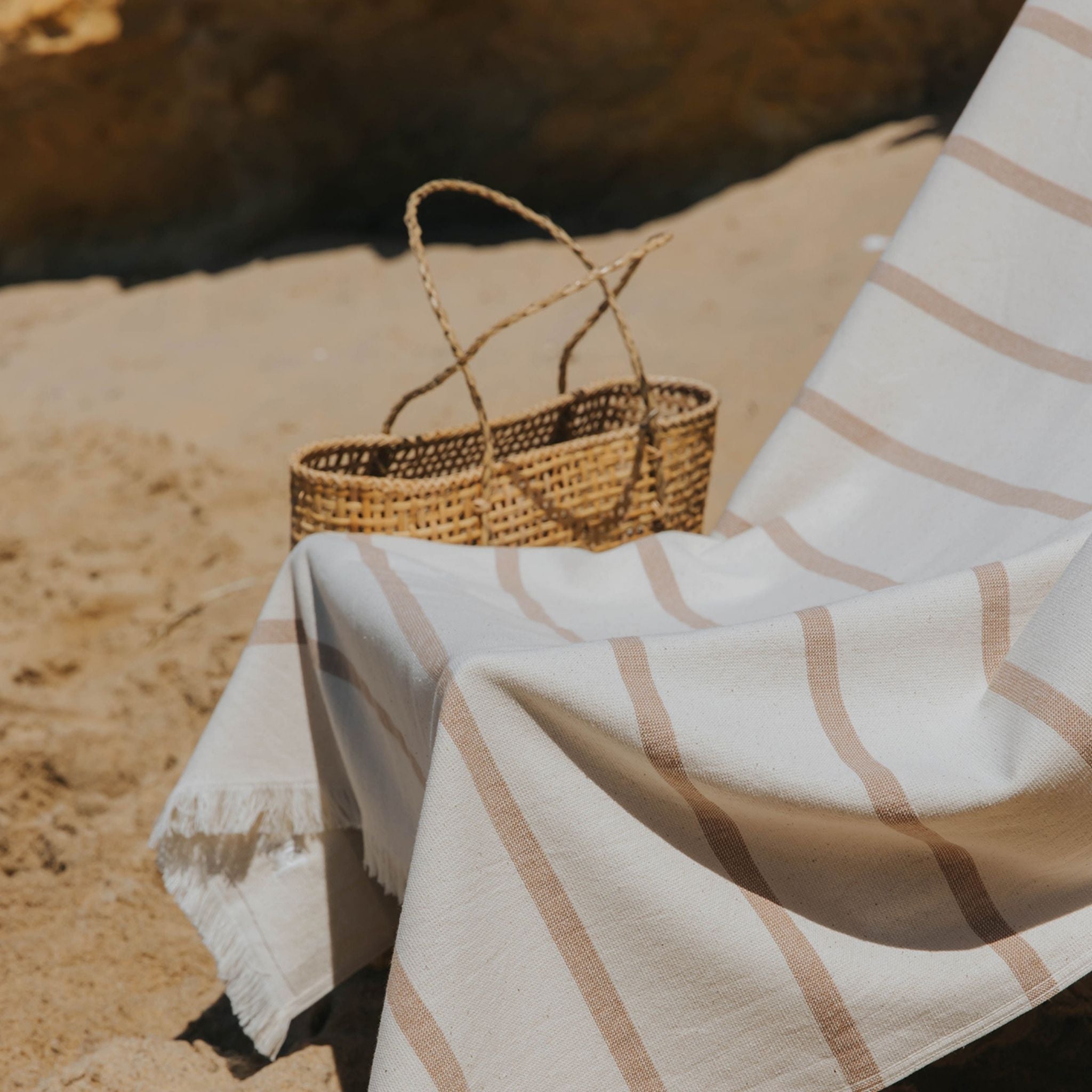torres-novas-beach-boa-nova-horizontal-stripes-towel-beige-lifestyle-1.jpg