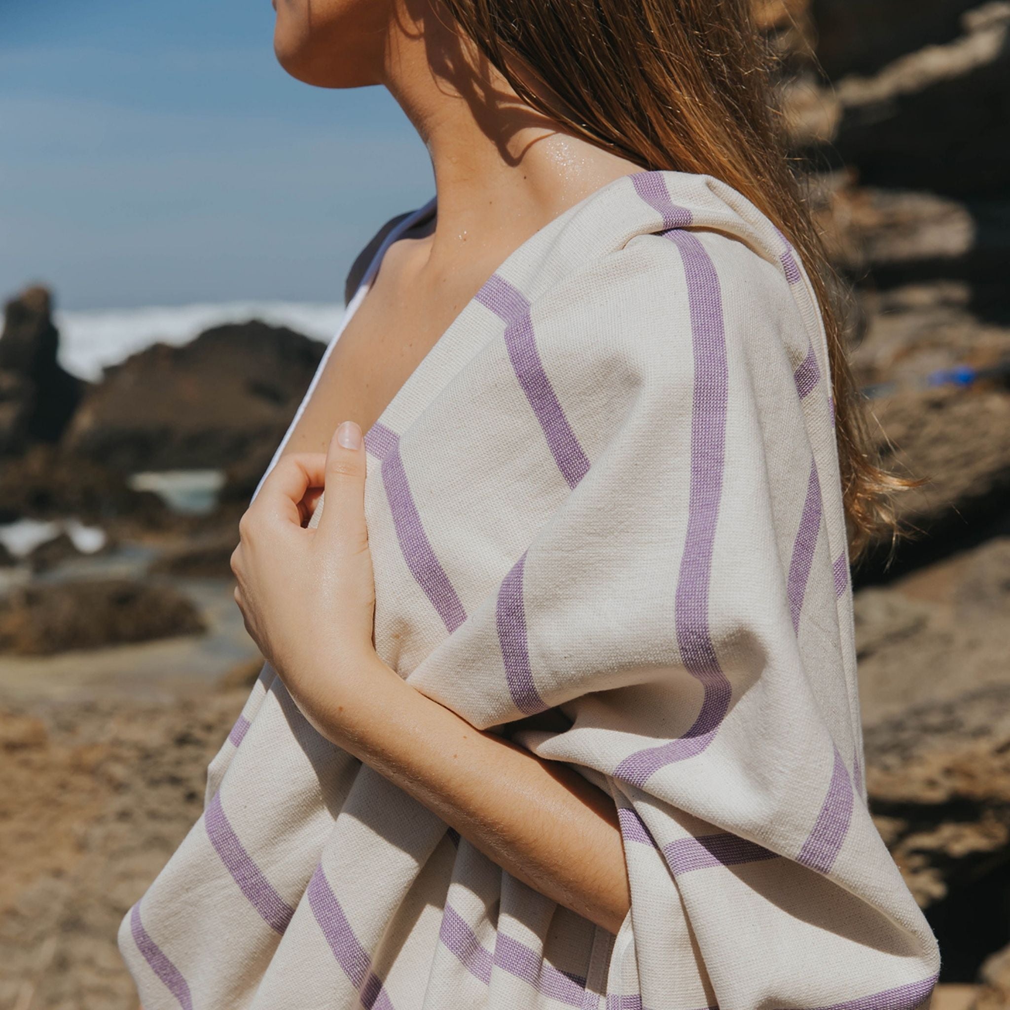 torres-novas-beach-boa-nova-horizontal-stripes-towel-lavender-lifestyle-1.jpg