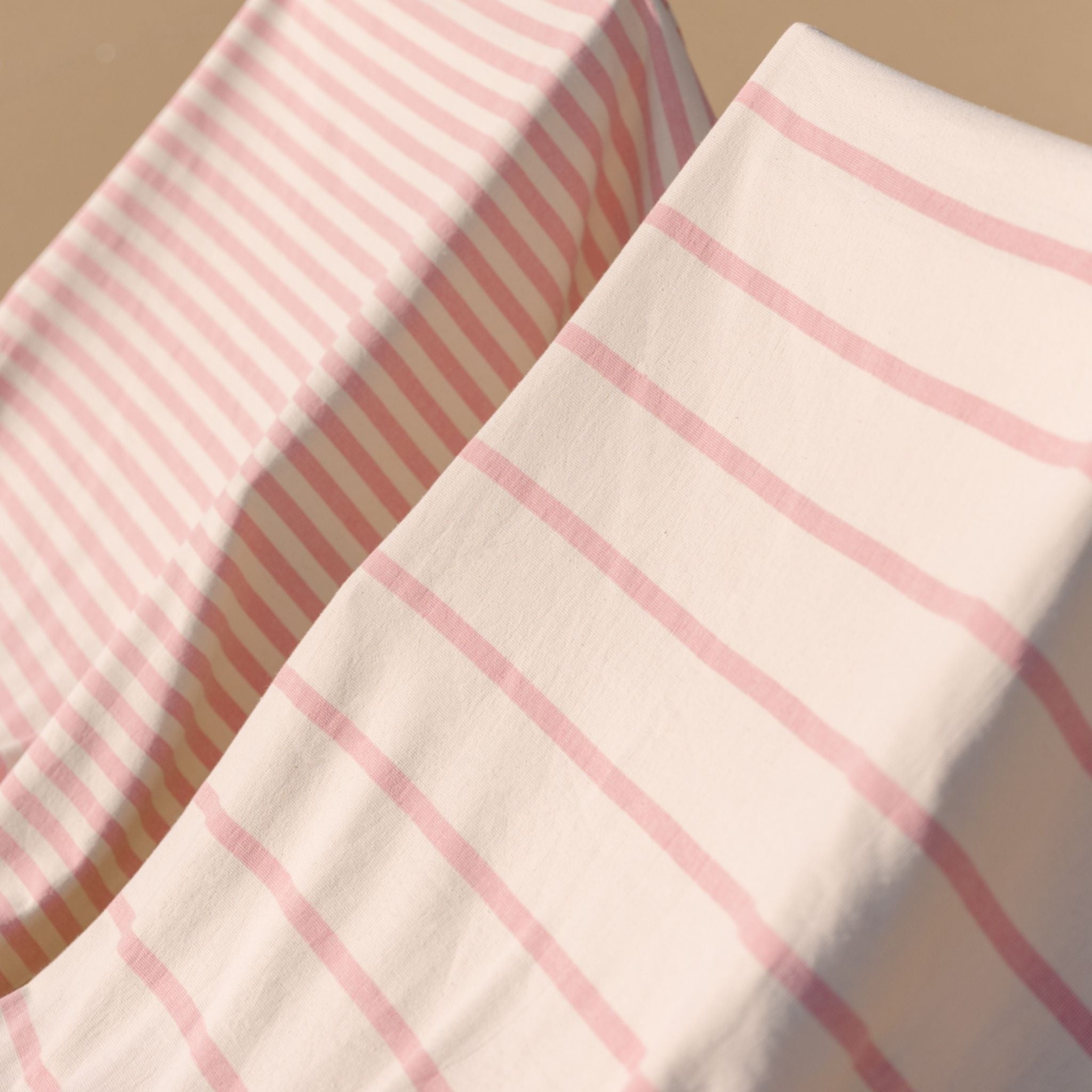 torres-novas-beach-boa-nova-horizontal-stripes-towel-pink-lifestyle-2.jpg