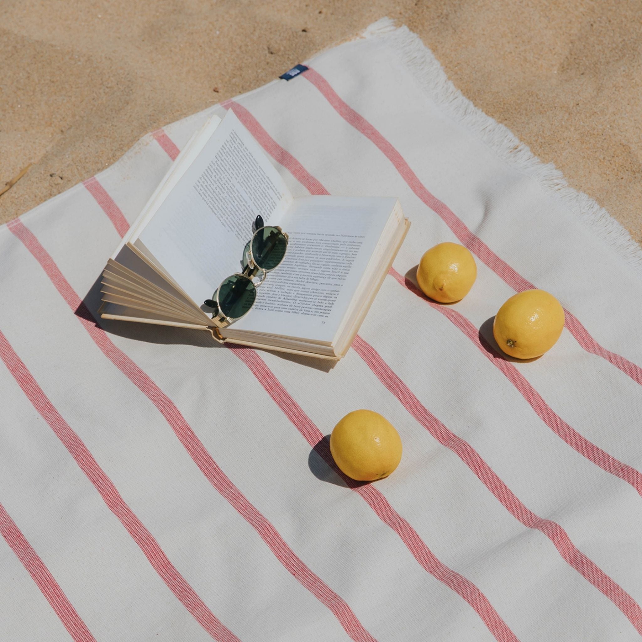 torres-novas-beach-boa-nova-horizontal-stripes-towel-red-lifestyle-1.jpg