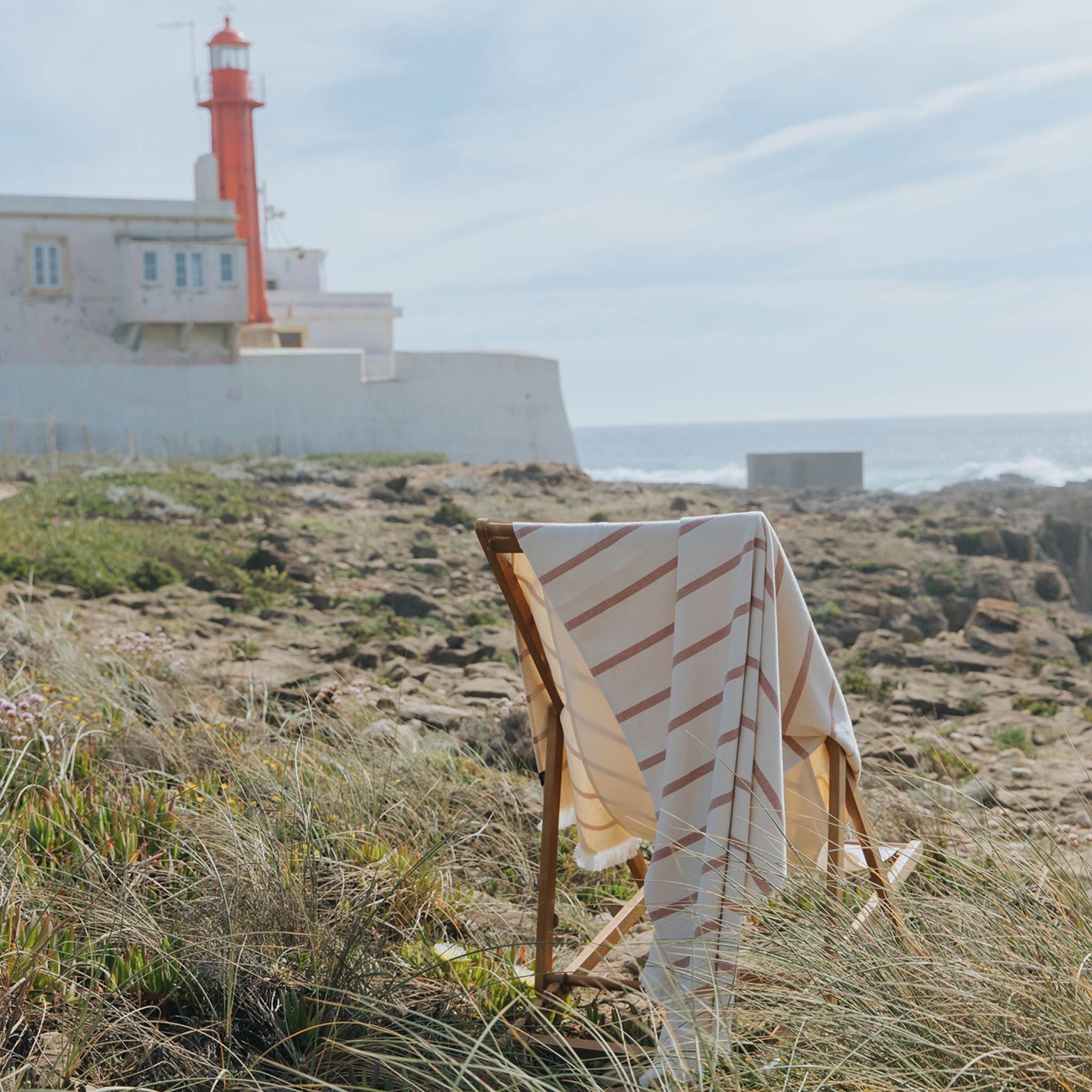 torres-novas-beach-boa-nova-horizontal-stripes-towel-terracotta-lifestyle-2.jpg