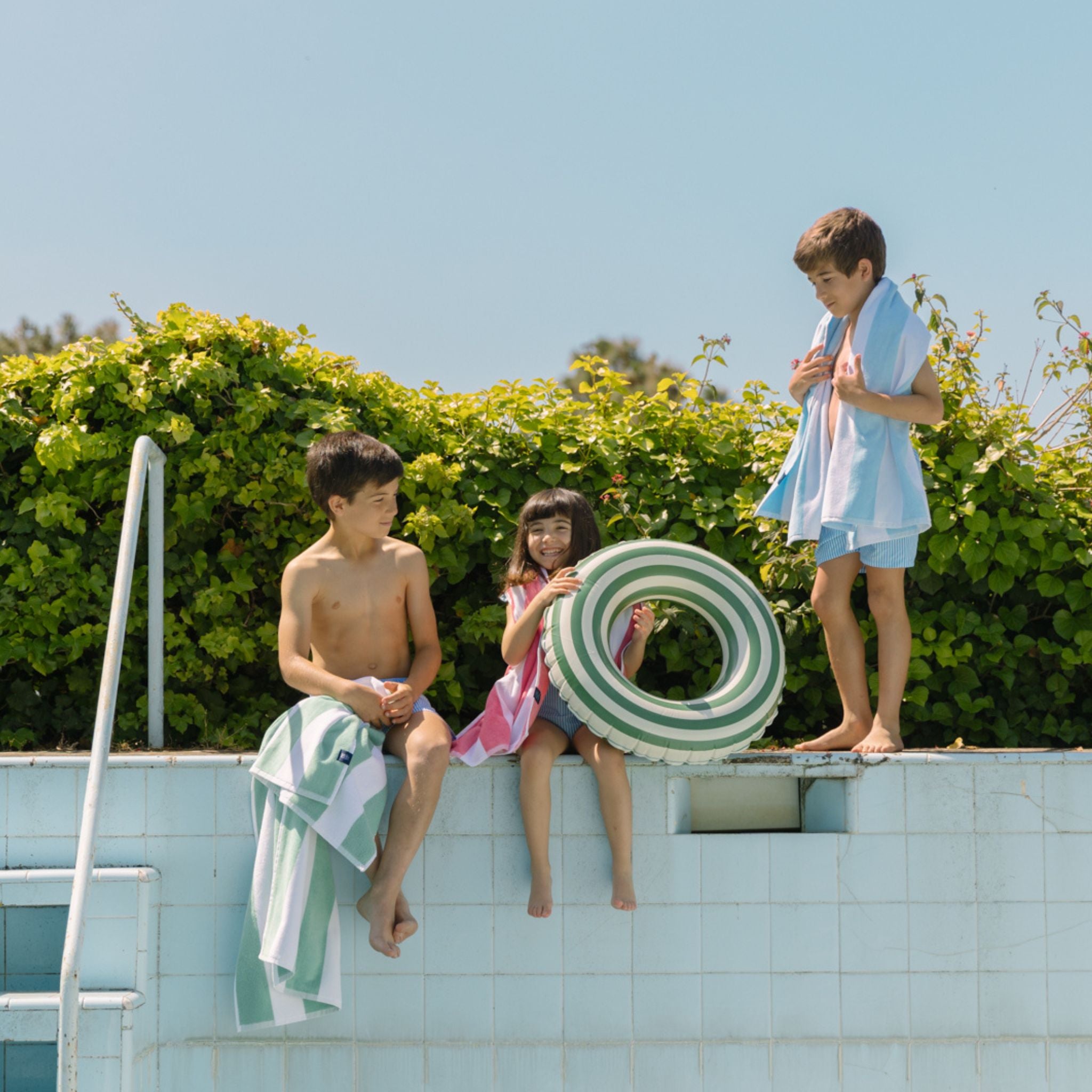 torres-novas-beach-gibalta-vertical-stripes-kids-towel-blue-sky-lifestyle-3.jpg