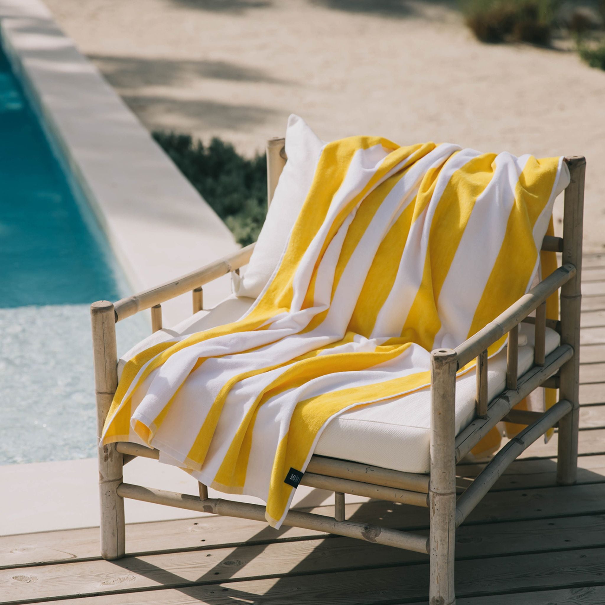 torres-novas-beach-gibalta-vertical-stripes-towel-yellow-lifestyle-2.jpg