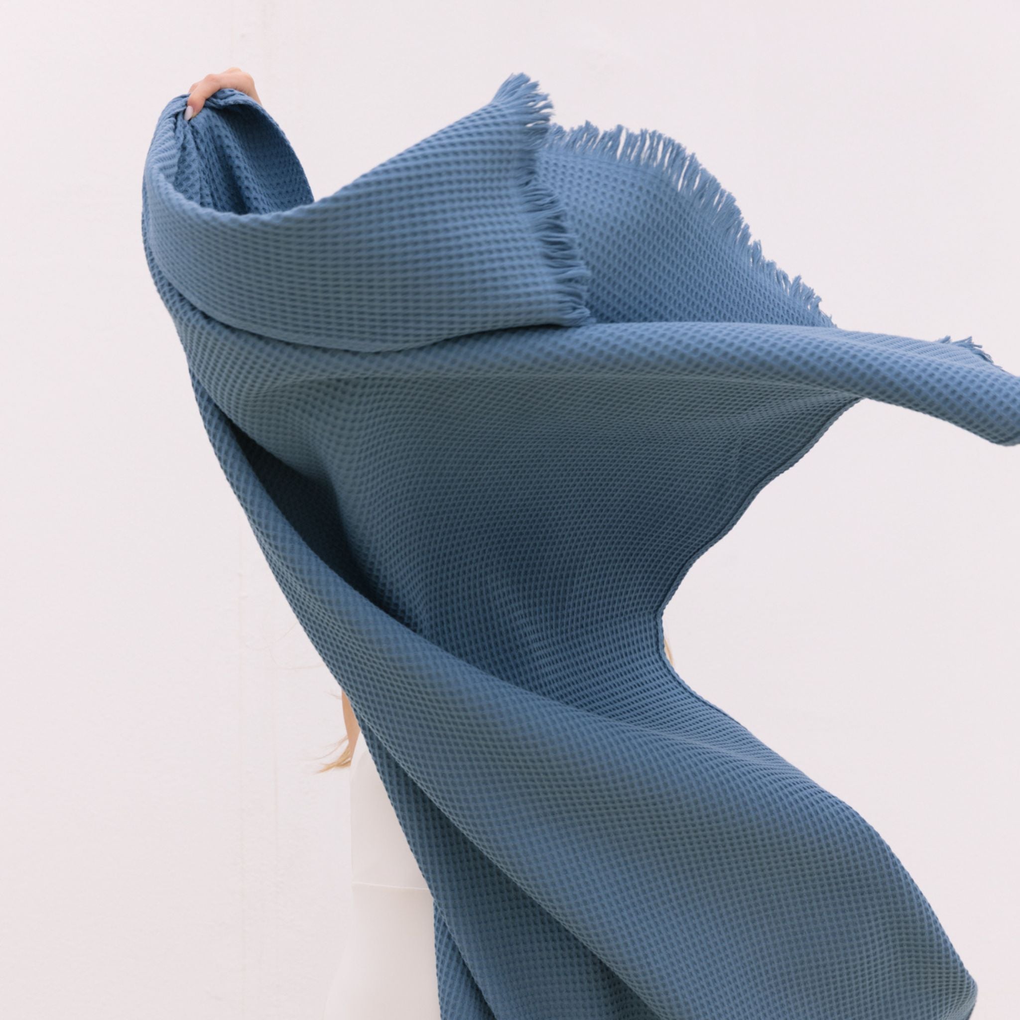 torres-novas-beach-santana-waffle-towel-blue-lifestyle-2_a62d0155-6b5b-48e8-b831-df7873d6dfc7.jpg