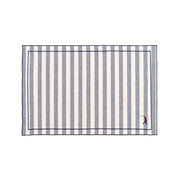 Barra cotton table linen with embroidered retro sports motifs