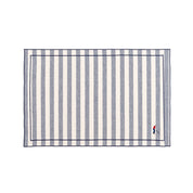 Barra cotton table linen with embroidered retro sports motifs