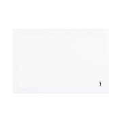 Nazaré white cotton table linen with embroidered retro sports motifs