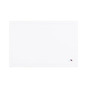 Nazaré white cotton table linen with embroidered retro sports motifs