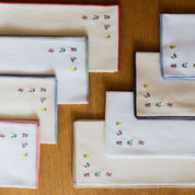Nazaré white cotton table linen with embroidered flowers